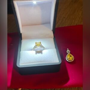 Beautiful ring and pendant set. Both are 925 silver with Mystic topaz stones